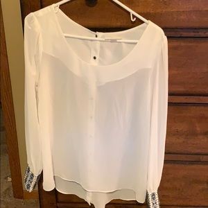 Long sleeve scoop neck with snaps down the back